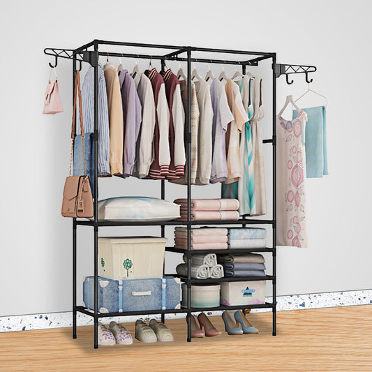 Metal garment rack with clothes and shoes in bedroom