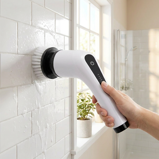 Electric spin scrubber cleaning white bathroom wall tiles