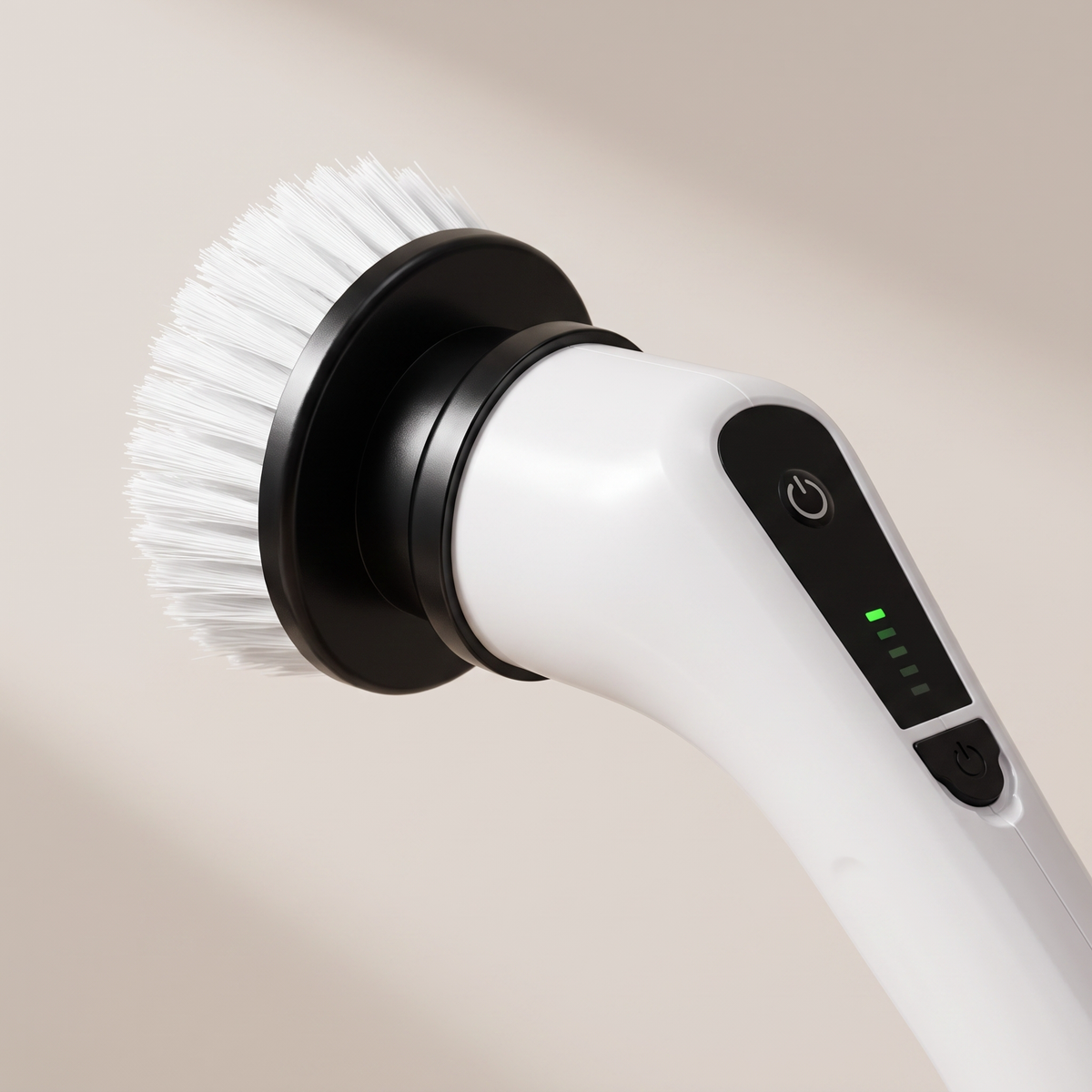 Close-up of the electric spin scrubber motor head with a brush head attached