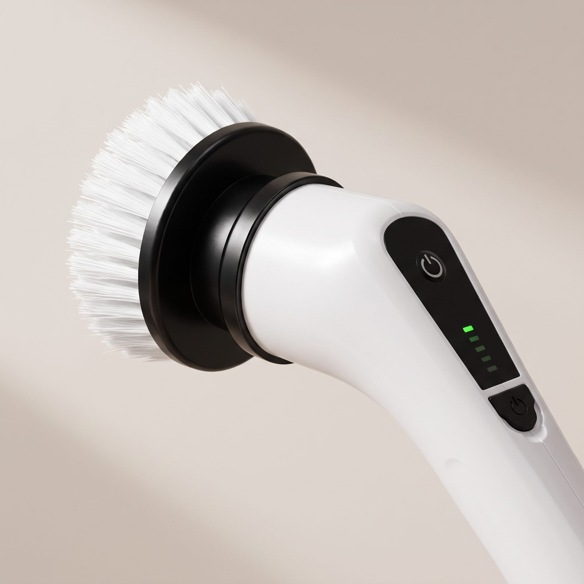 Close-up of the electric spin scrubber motor head with a brush head attached