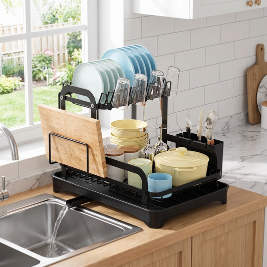 2-tier dish drying rack holding clean dishes beside the sink, three-quarter angle